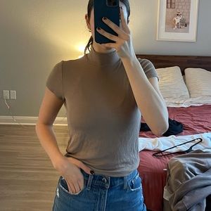 Super cute Zara light brown ribbed mock neck top. Size (M)